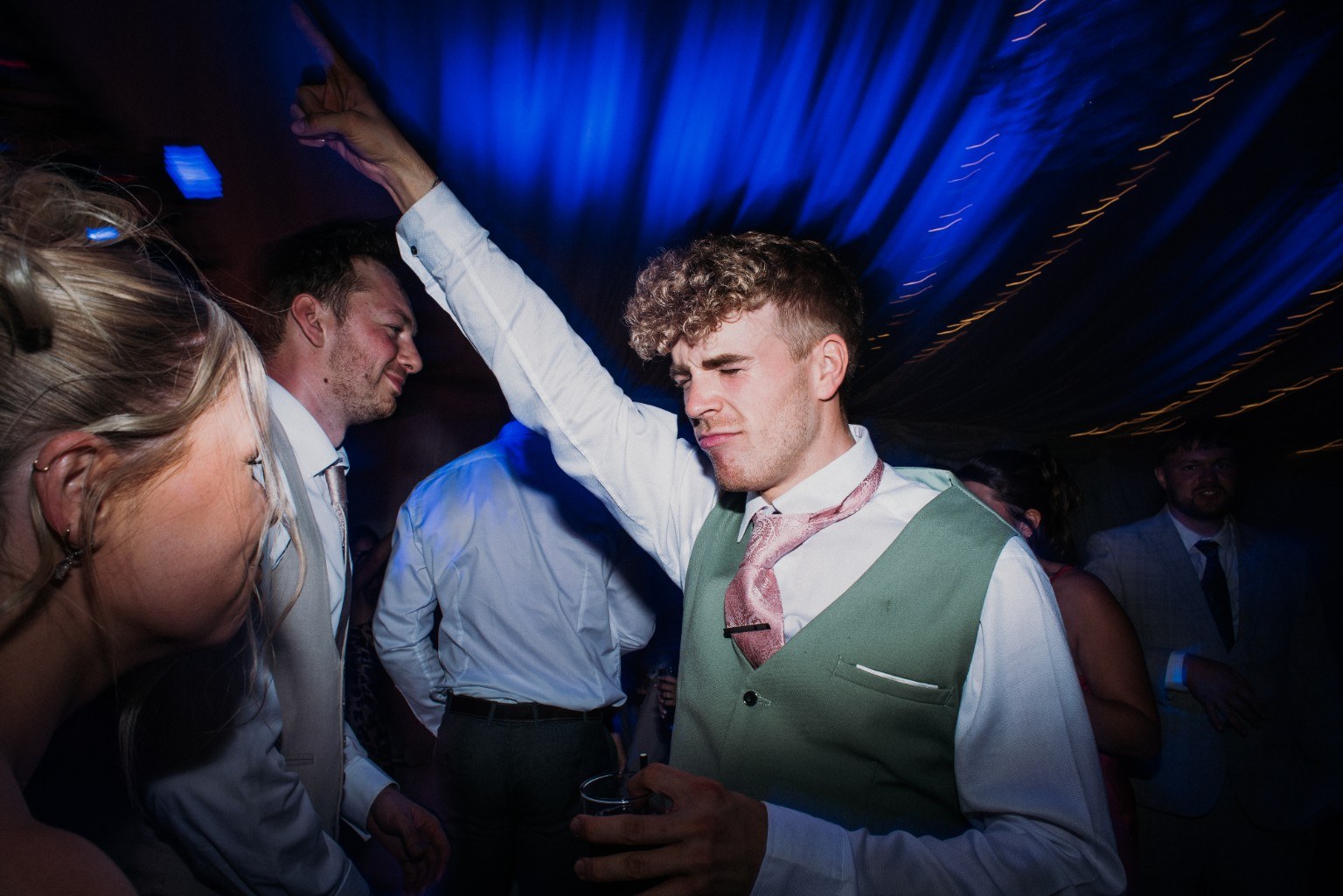 Guests celebrating on the dance floor