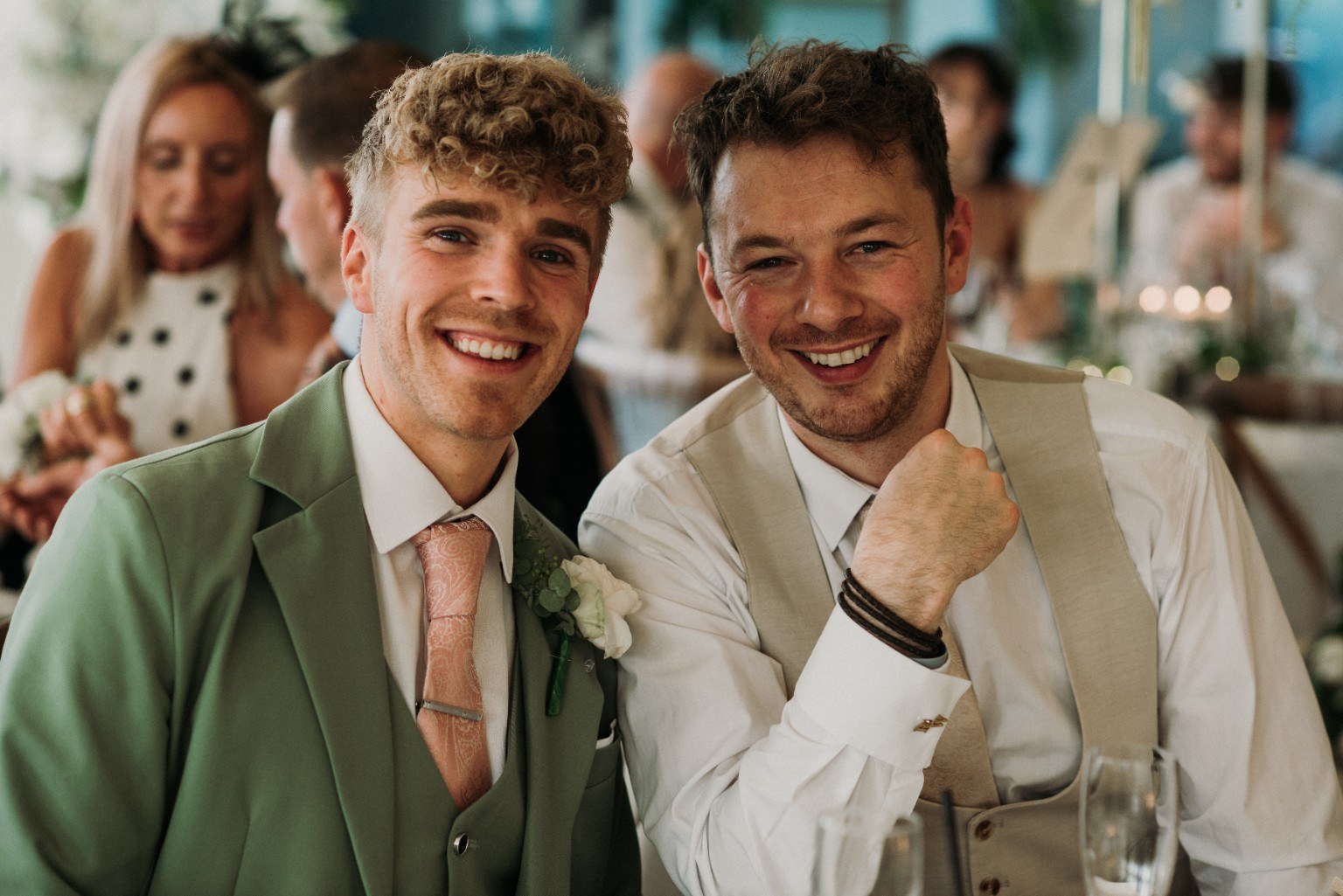 Kieran with a groom at a wedding breakfast